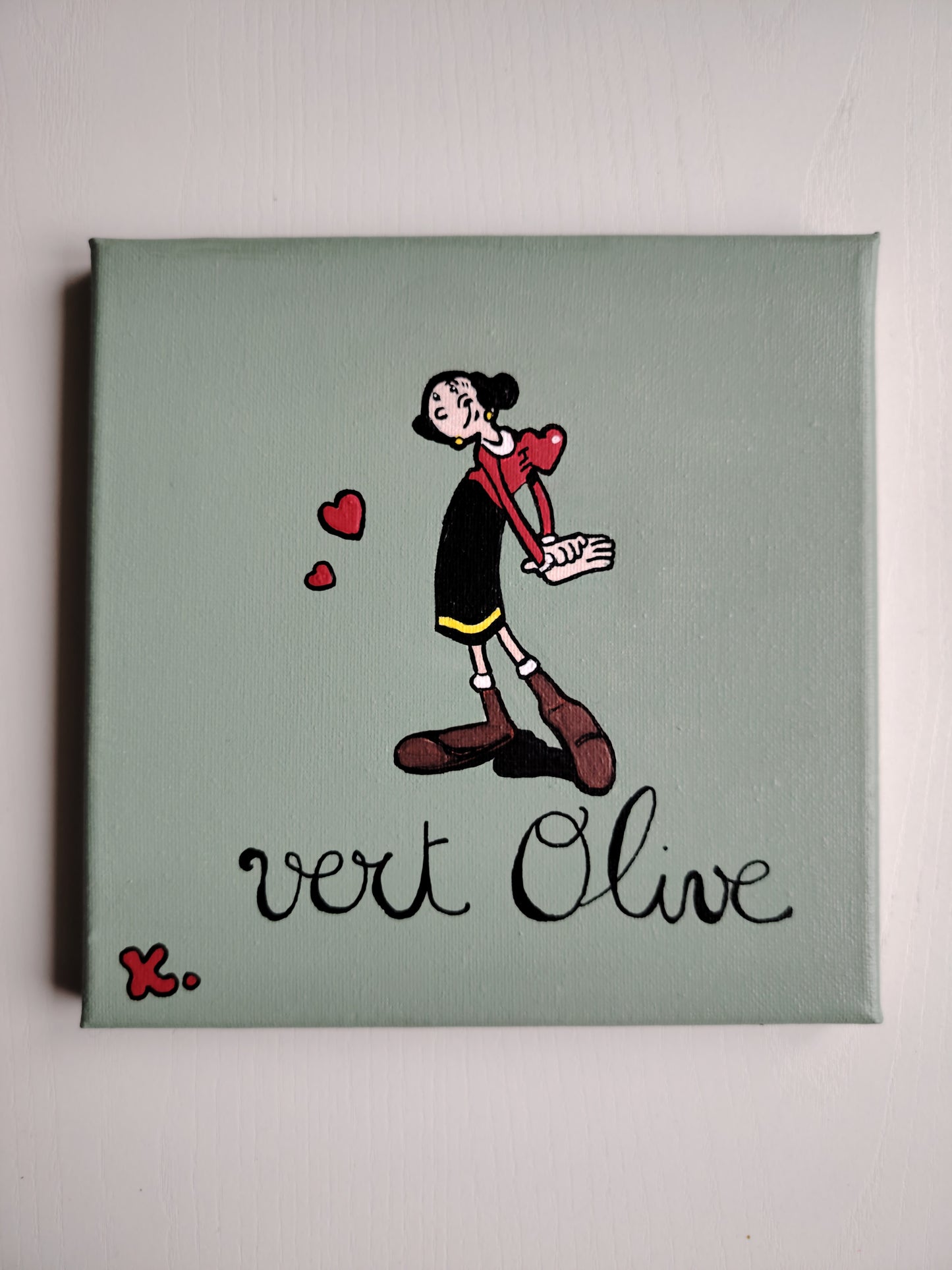 Peinture KOA Vert Olive vendue exposée en intérieur, œuvre contemporaine pop et décorative