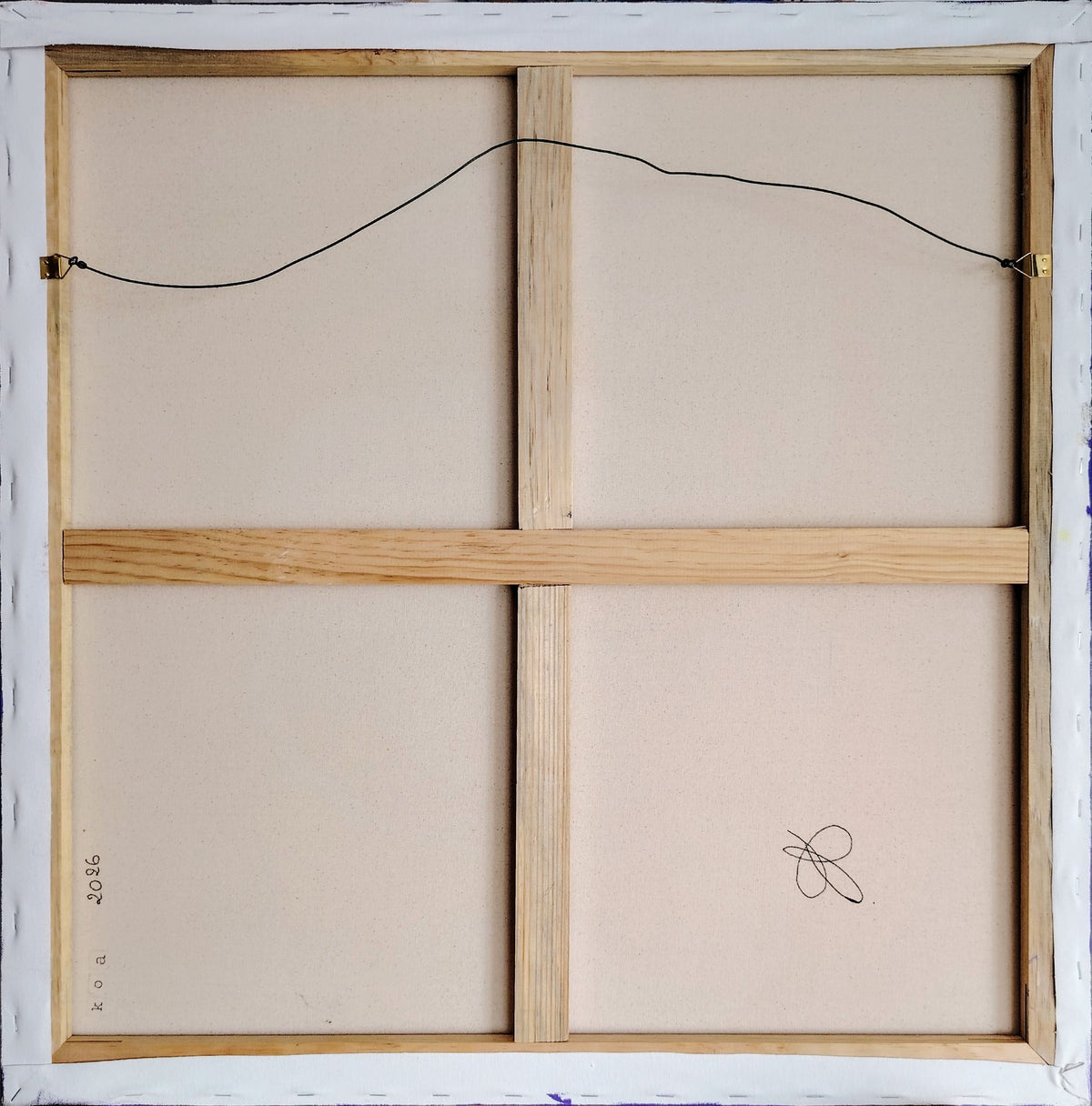 arrière de la toile crois de l'artiste koa en 2026