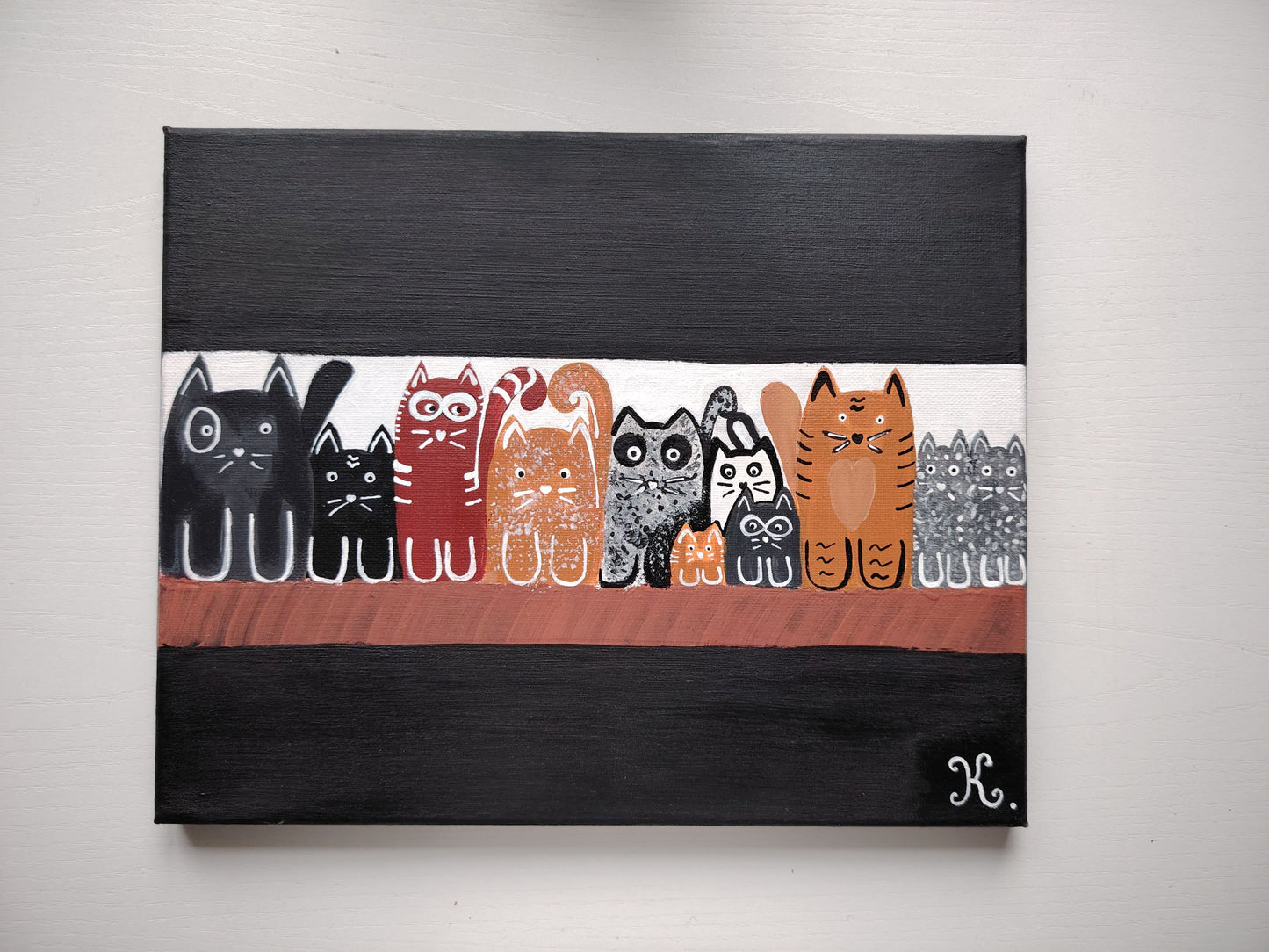 Peinture KOA Cats exposée en intérieur neutre, œuvre contemporaine pop graphique et décorative